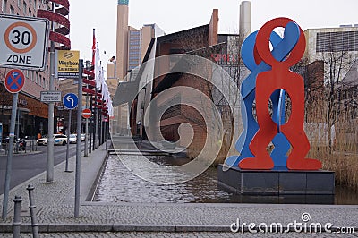 Berlin, Germany: the installation Boxers by Keith Haring in VoxstraÃŸe Editorial Stock Photo